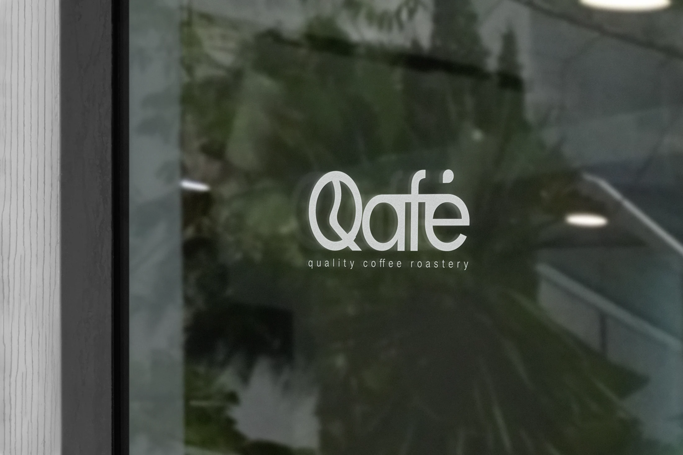 Qafé brand identity on glass